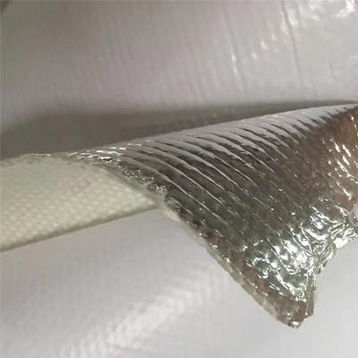 Heat shield barrier with adhesive